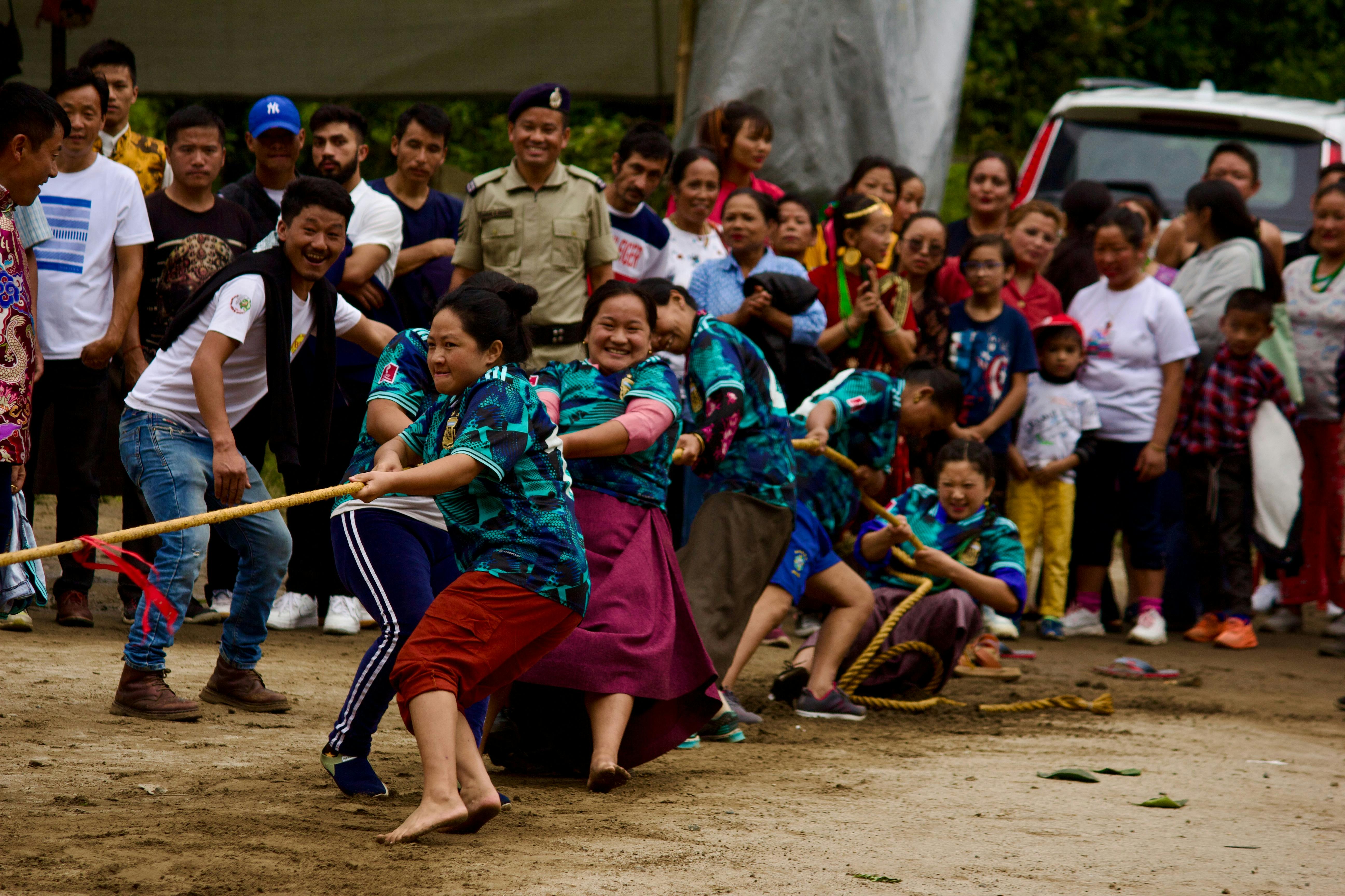 women pulling rope