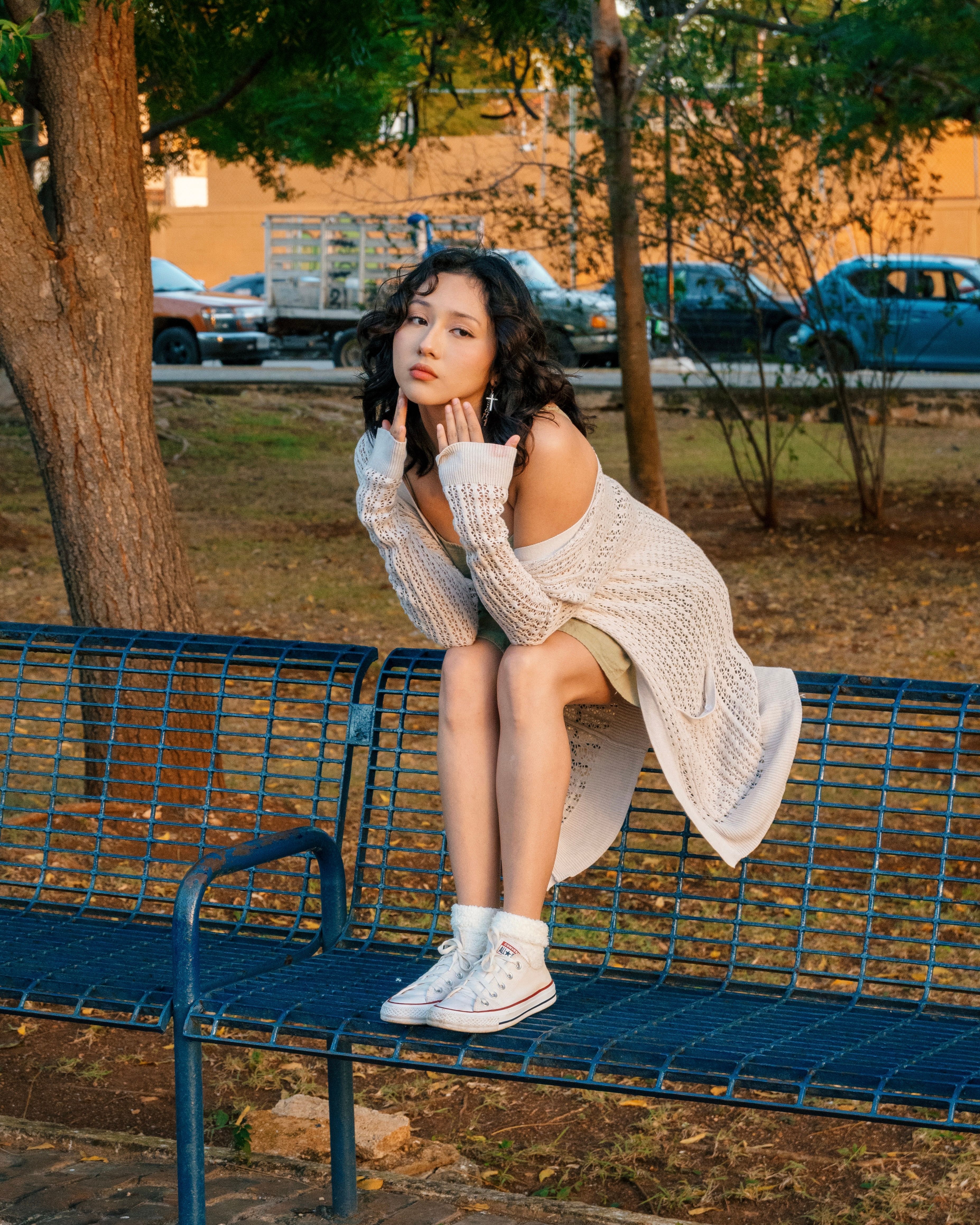 Young Beautiful Brunette Woman Sitting on a Bench in a Park · Free ...