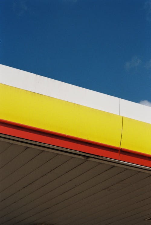 Foto d'estoc gratuïta de cel blau, fons de pantalla, gasolinera