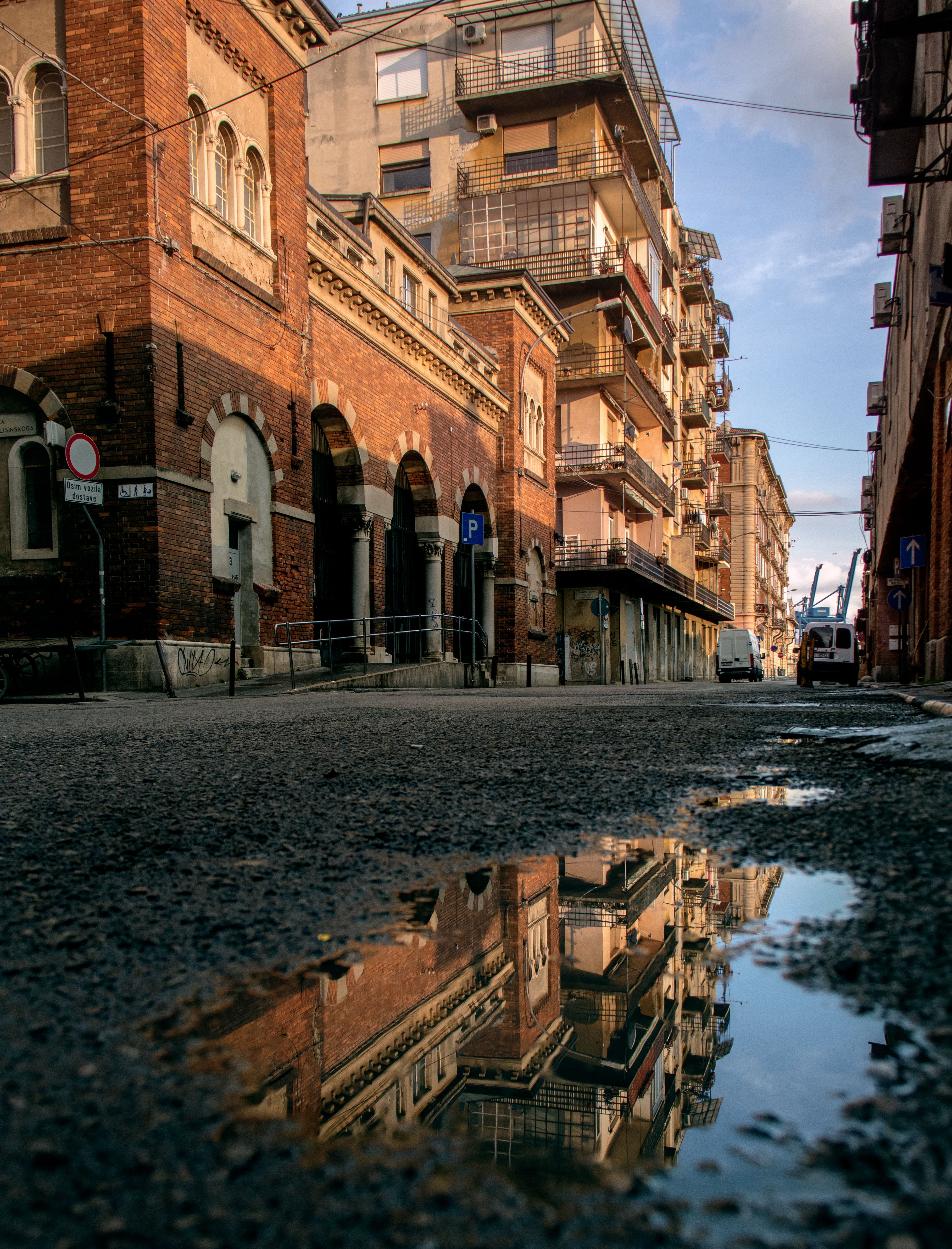 Buildings Reflection on Street in Town · Free Stock Photo