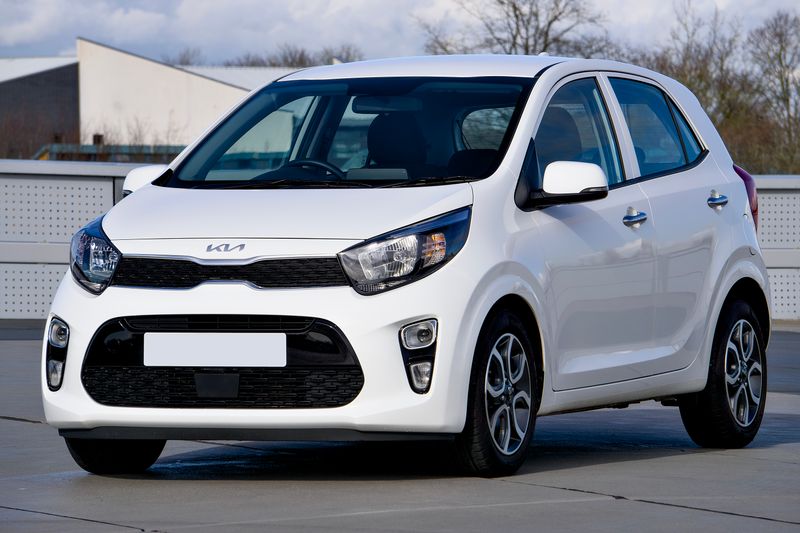 White city car in urban setting