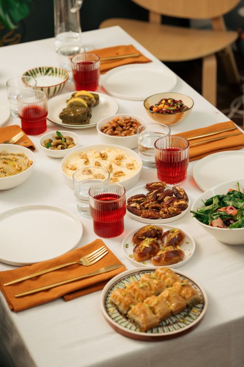 Free A beautifully arranged Turkish feast featuring various traditional dishes on a dining table. Stock Photo