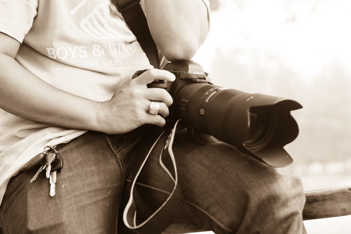 Man Holding Dslr Camera · Free Stock Photo