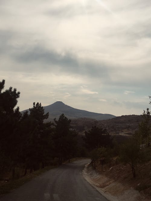 Winding Road Among Hills and Mountains