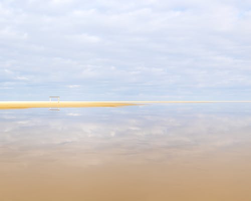 Gratis stockfoto met aan het strand, aan zee, bewegende wolken