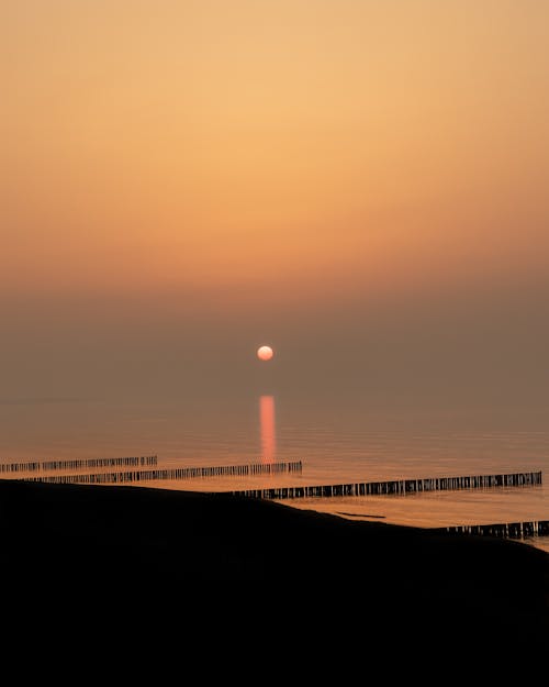 Безкоштовне стокове фото на тему «біля моря, вечірнє небо, вечірнє сонце»