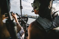 Woman in Gray Shirt Holding Black Dslr Camera