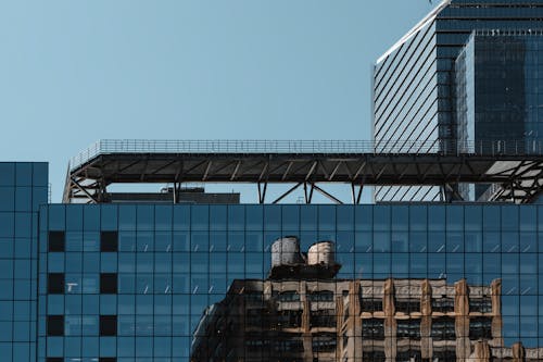 A building with a glass roof and a clock on it