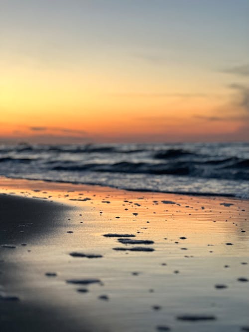 Reflection of the red sky during sunset in Usedom, Germany