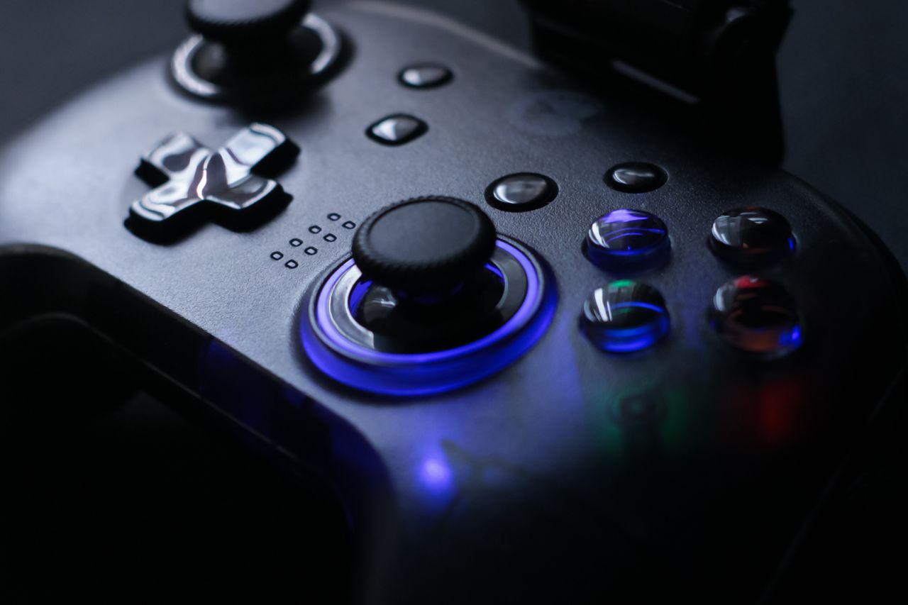 detailed shot of a gaming controller with glowing led lights perfect f