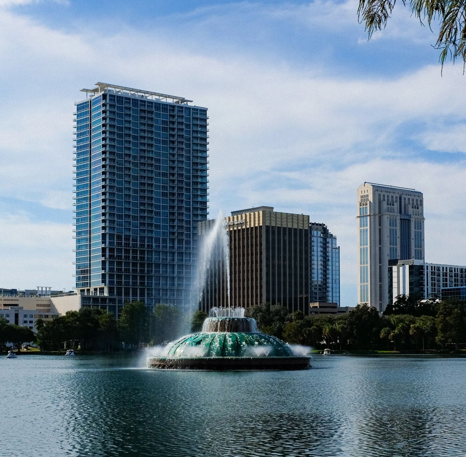 Lake Eola Park fountain with modern skyscrapers