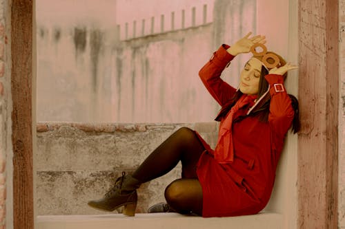 Woman Posing in Red Dungarees 