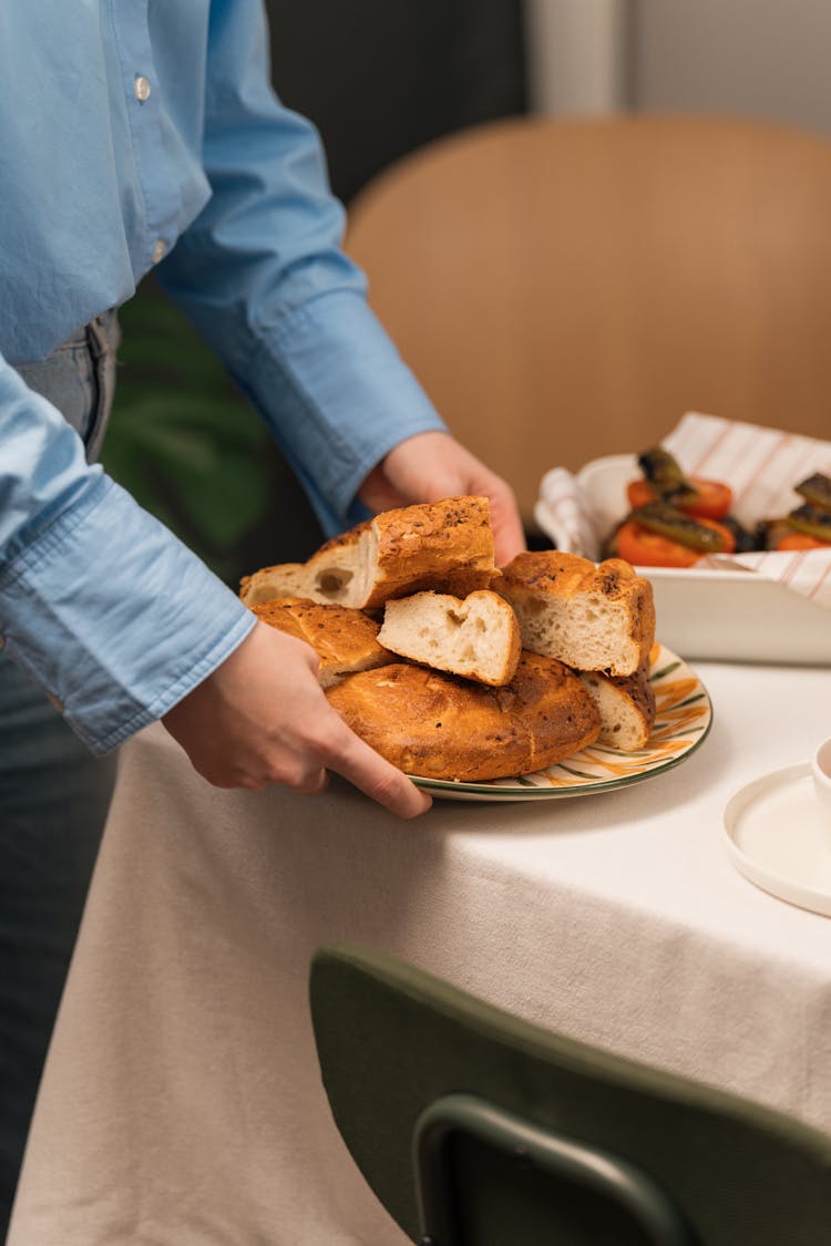 Woman Serving Food For Ramadan