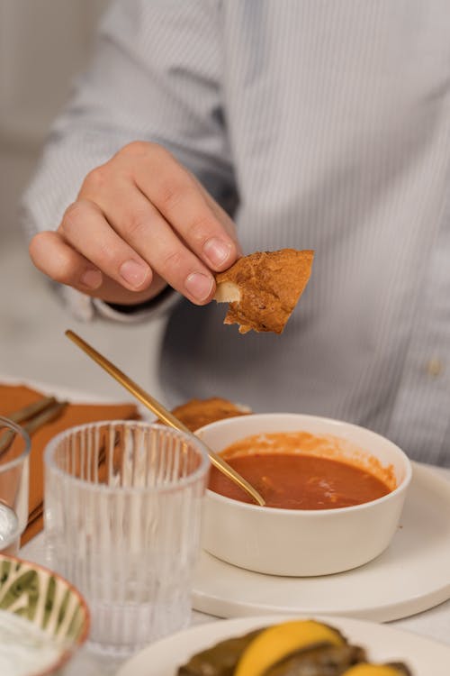 Person Eating a Soup 