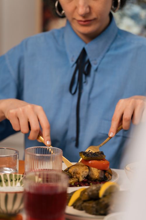 Free Individual dining, focused on a gourmet meal with elegant utensils. Perfect for food and lifestyle themes. Stock Photo