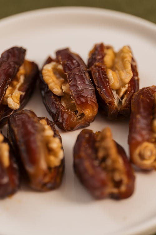 Dates with walnuts on a plate
