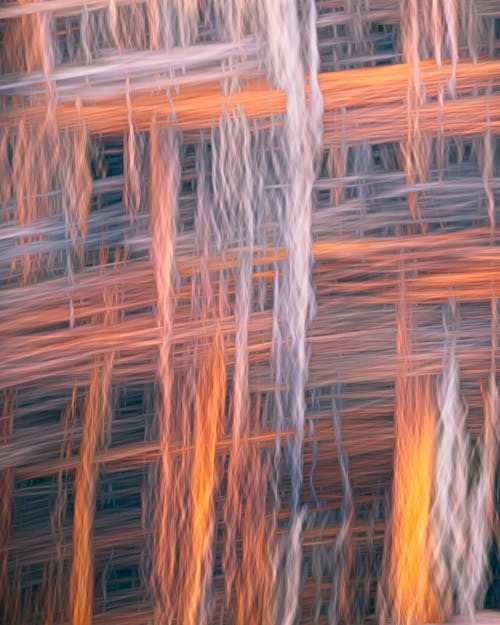 Abstract painting of a wooden fence with orange and white lines