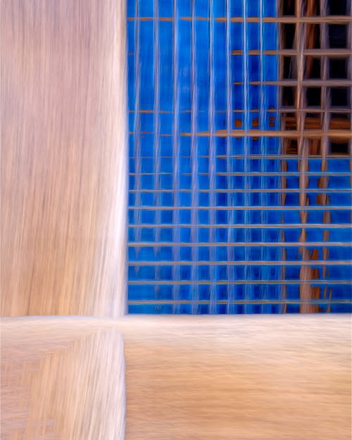 A close up of a wooden fence with blue and brown