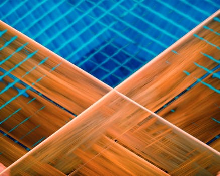 Intricate abstract artwork featuring dynamic blue and brown stripes with expressive motion.
