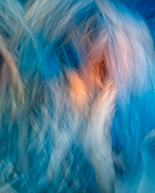 Abstract image of a woman in blue and orange