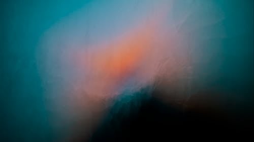 An abstract image of a blue and orange light