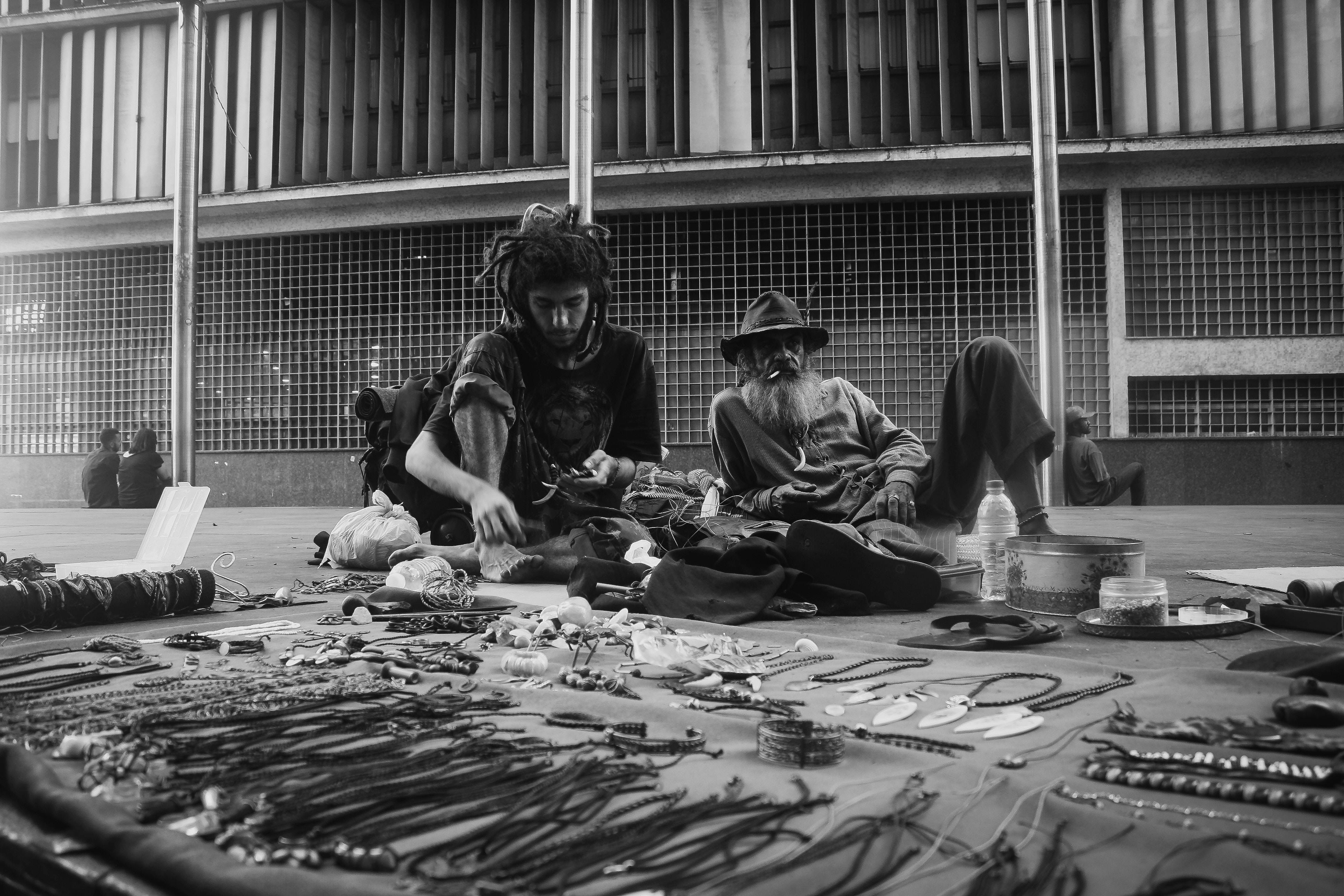 Two Men Sitting On Floor · Free Stock Photo