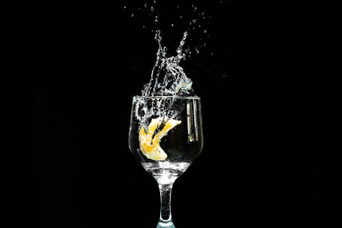 Free Lemon in the Water Filled Wine Glass Stock Photo