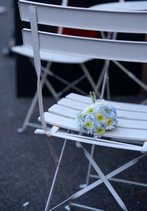 Bouquet of Flowers on a Folding Chair