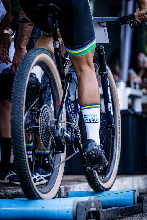 A person riding a bike on a track