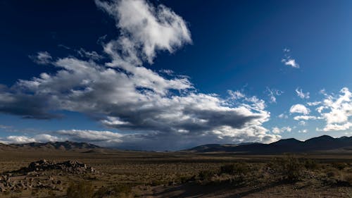 Gratis lagerfoto af bjerge, ørken, skyer