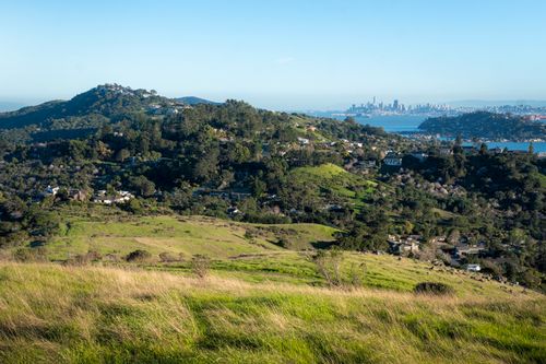 Free Picturesque view of Bay Area hills and San Francisco cityscape in summer light. Stock Photo