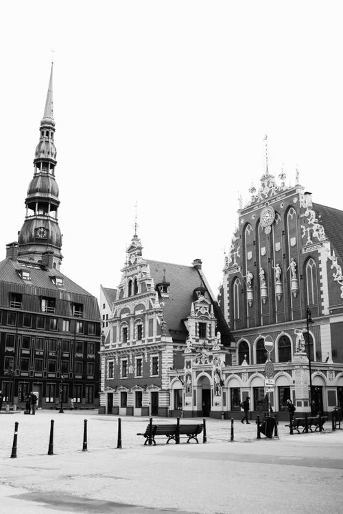 Free Captivating black and white image of architectural landmarks in Riga, Latvia's old town. Stock Photo