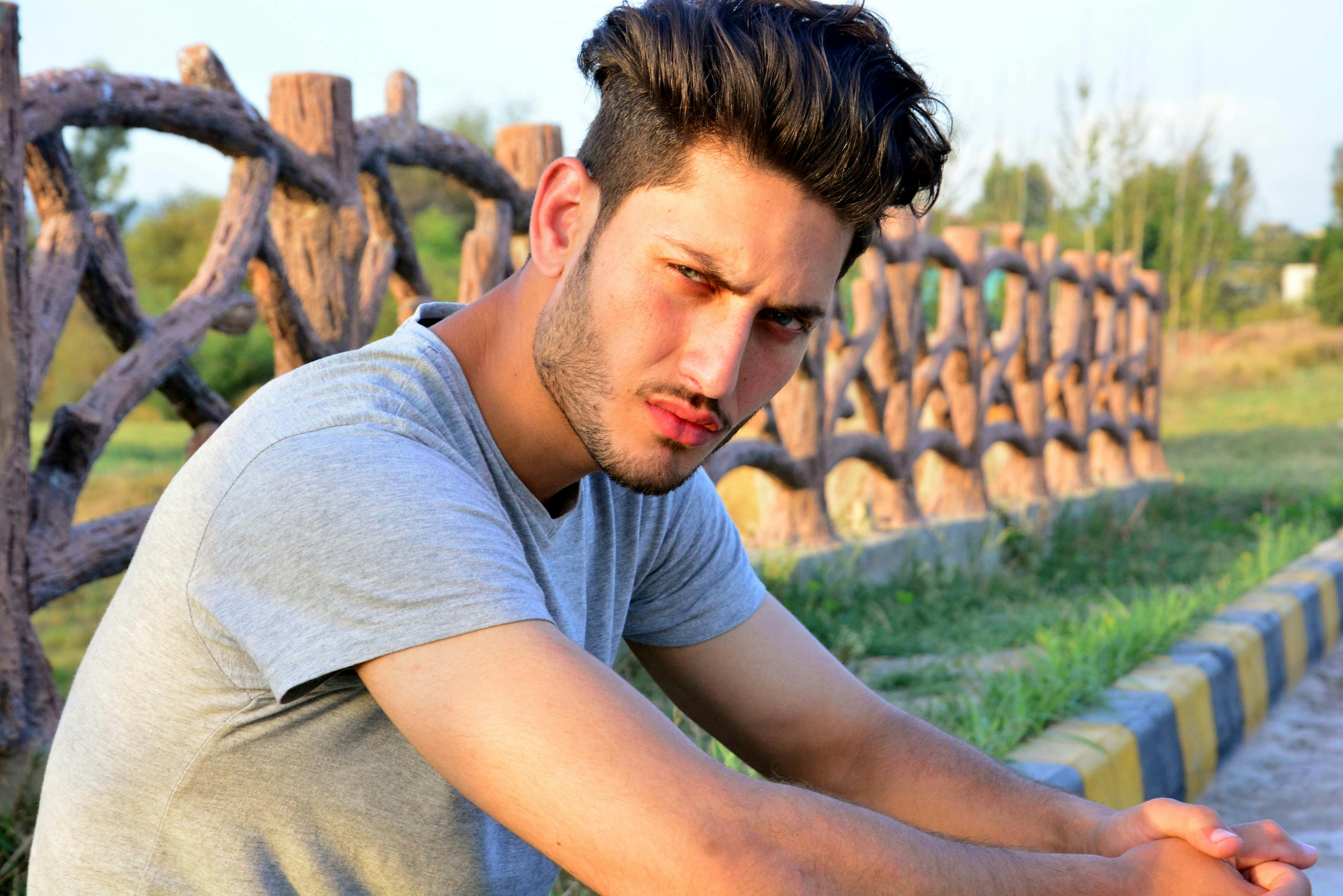 a man sitting outdoors