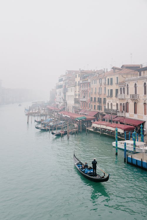 Gondola on Venetian Canal on Foggy Day