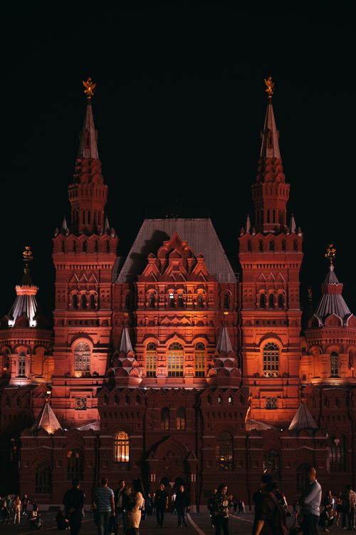 Free A beautifully lit gothic architecture in Moscow, capturing nighttime elegance. Stock Photo