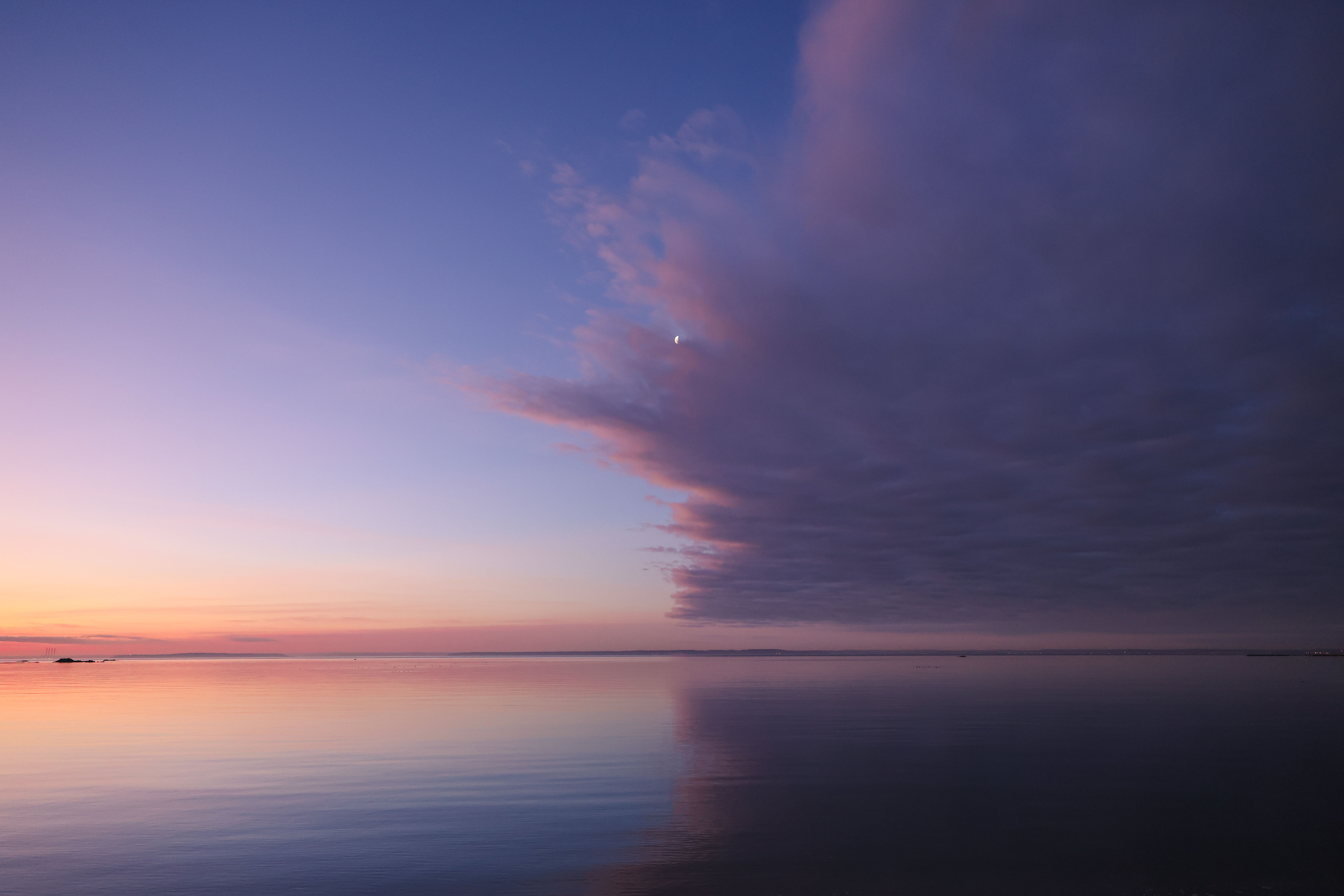 Clouds over a Lake at Dusk · Free Stock Photo