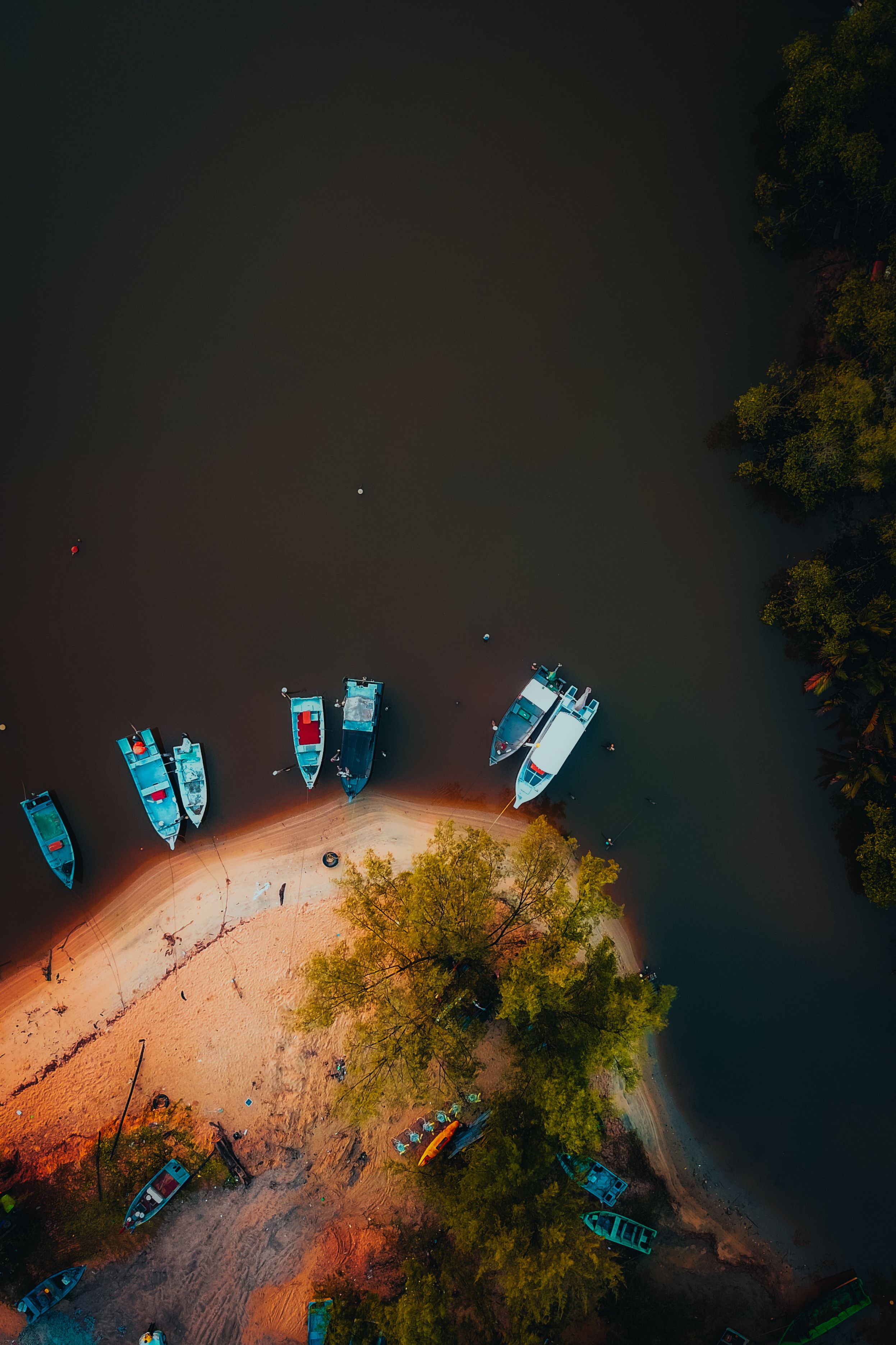 Aerial View of Boats Moored on a Sandy Lakeshore · Free Stock Photo