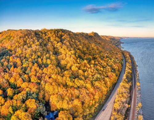 Free Stunning aerial view of colorful autumn forest by a river in Stockholm, Wisconsin. Stock Photo