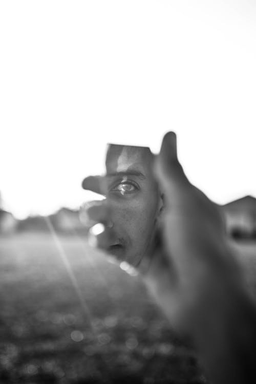 Grayscale Photo of Human Hand