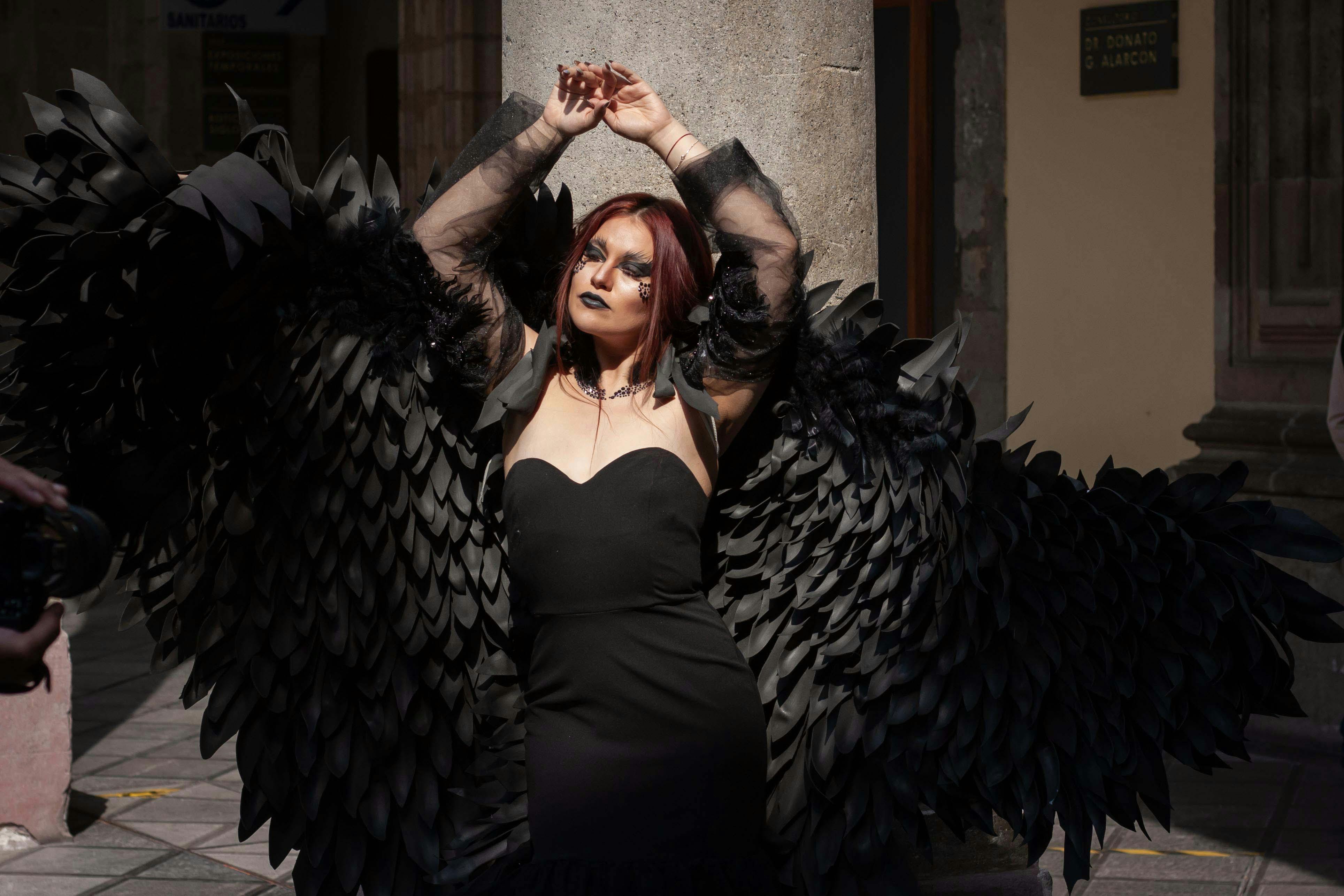 Woman in Black Dress and with Angel Wings · Free Stock Photo