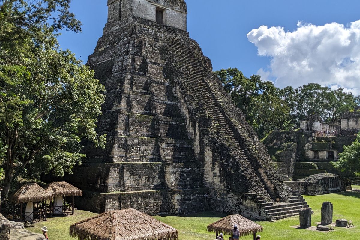 Mayan ruins of Tikal rising above the jungle canopy