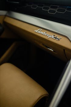 Luxurious interior of a Lamborghini vehicle showing sleek design and branding in New Delhi, India.