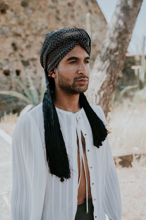 Man in Turban and White Shirt