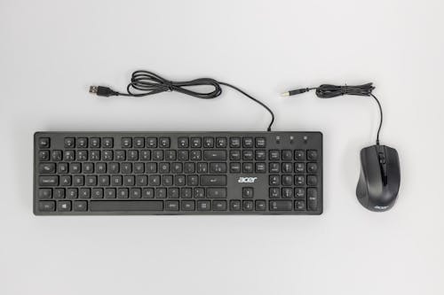 A keyboard and mouse on a white background