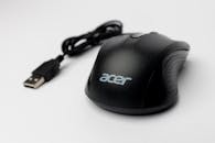 Base of a Black Computer Mouse on a White Background