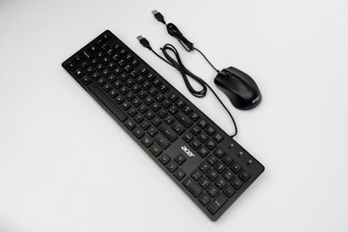 A keyboard and mouse on a white background