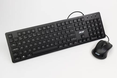 A keyboard and mouse on a white background