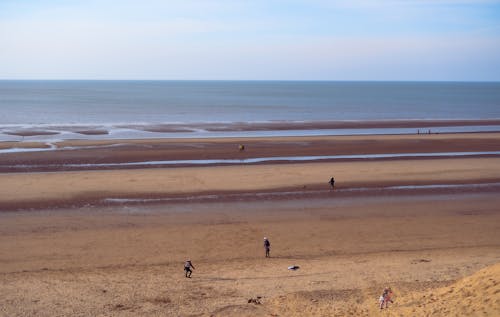 Foto profissional grátis de areia, beira-mar, céu