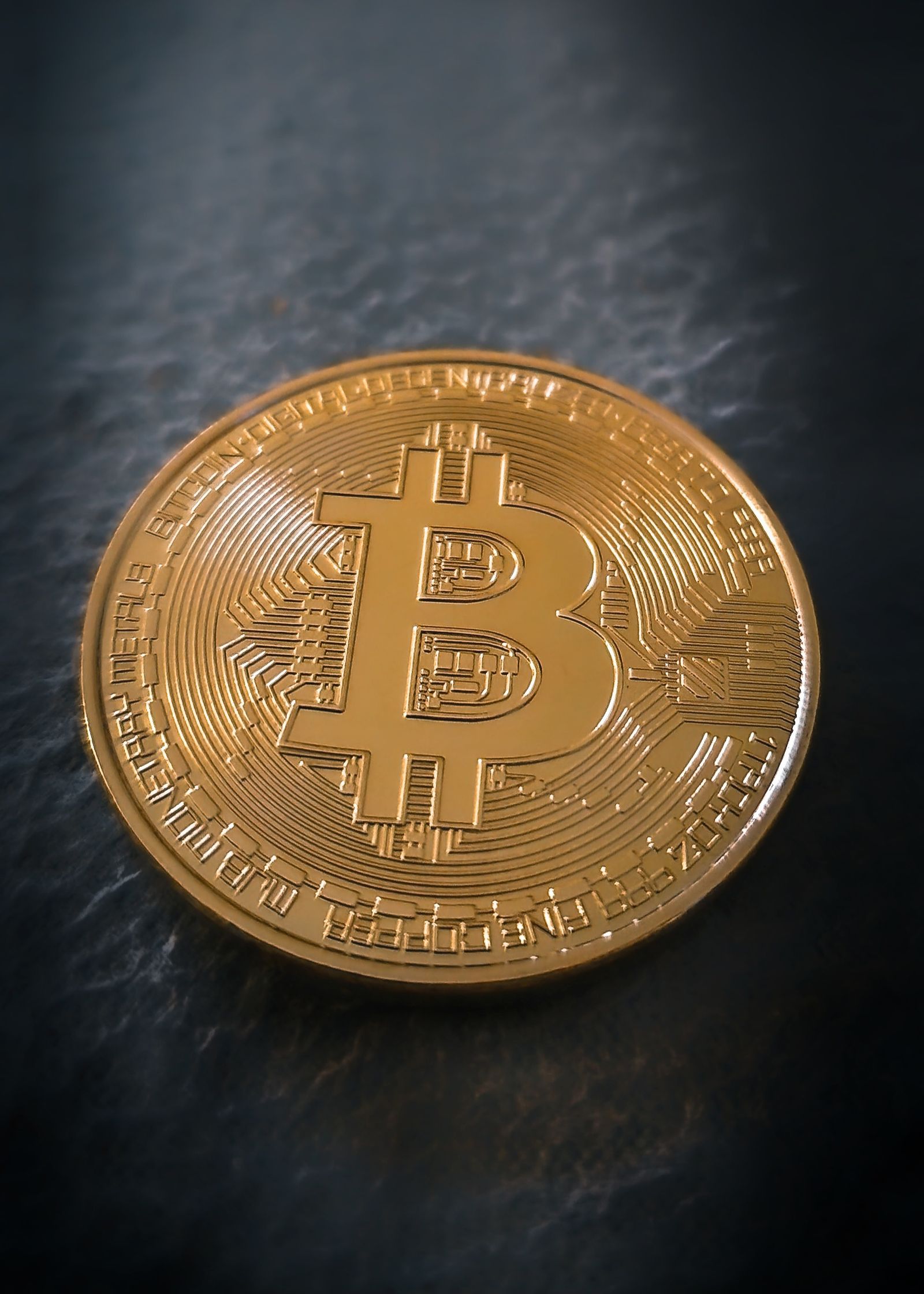 Close-Up Shot of a Bitcoin · Free Stock Photo