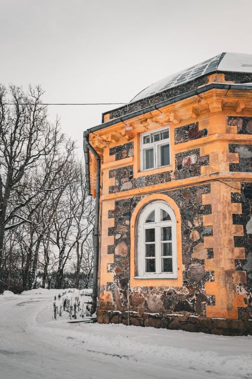 Free Exterior of Krimulda Manor in winter, featuring snowy surroundings in Latvia. Stock Photo